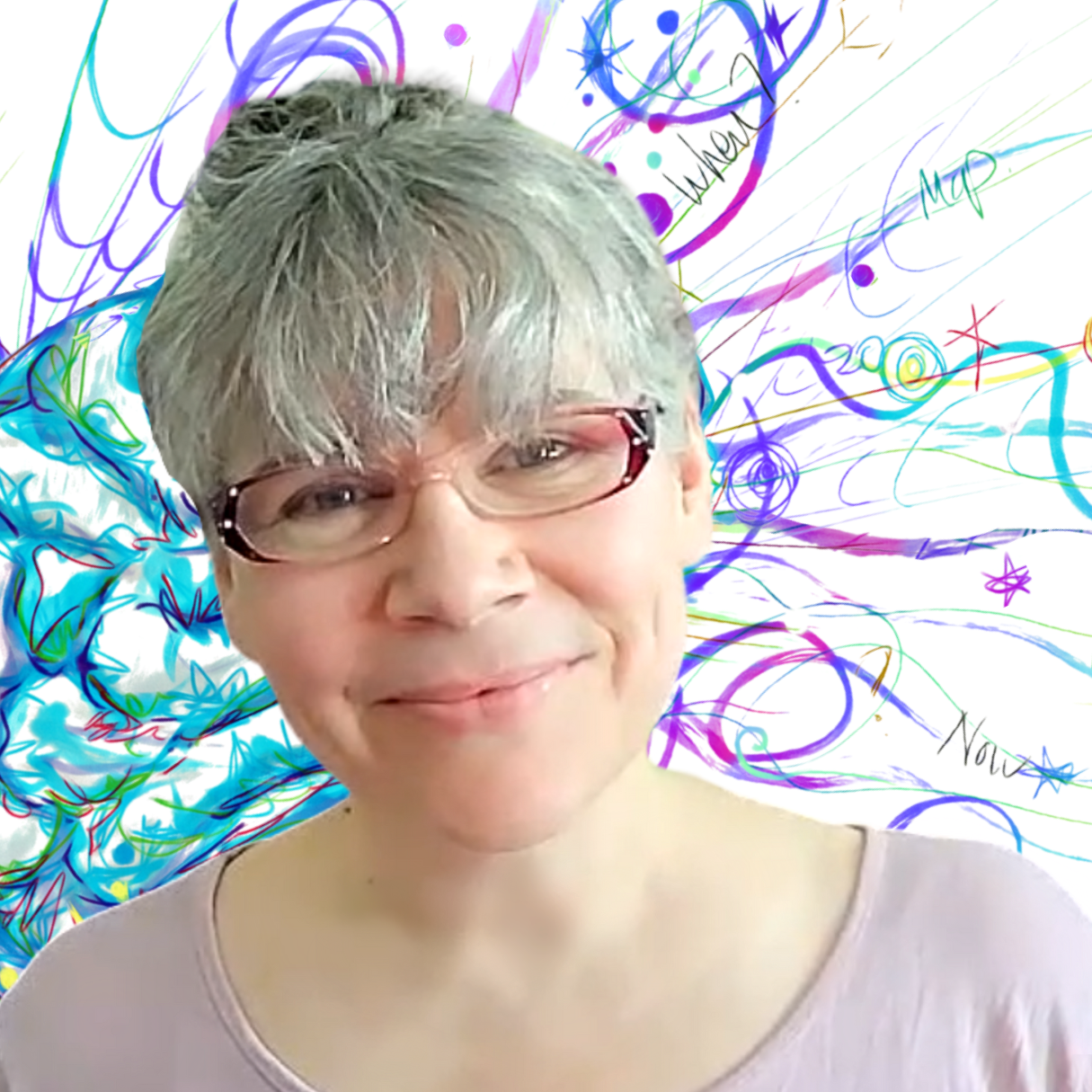 A circular picture of Julia smiling directly at the camera. Julia is a white woman with long gray hair tied in a bun, and is wearing glasses. In the background the brightly coloured swirls of The Beautiful Neurodivergent Brain image can be seen.
